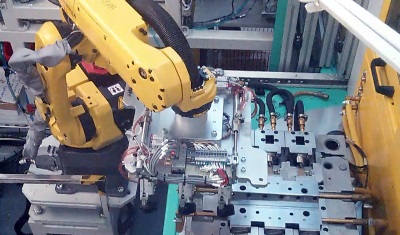 Leak Test Cell with Robotic Handling